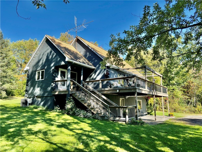 A delightfully crafted log cabin home in a private setting of 1 - Beach Home for sale in Jerusalem, New York on Beachhouse.com