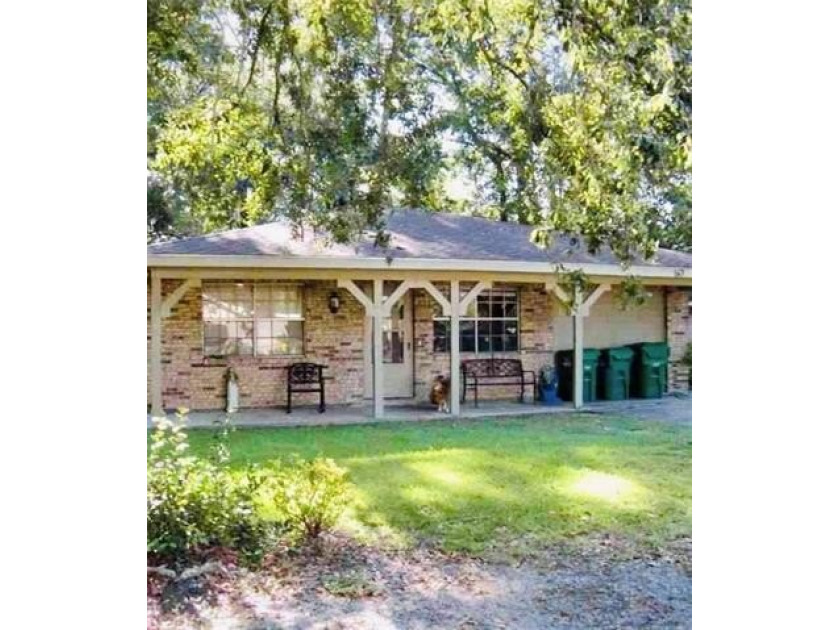 LOCATION LOCATION LOCATION!! Absolutely charming 3 Bedroom / 1 - Beach Home for sale in Mandeville, Louisiana on Beachhouse.com