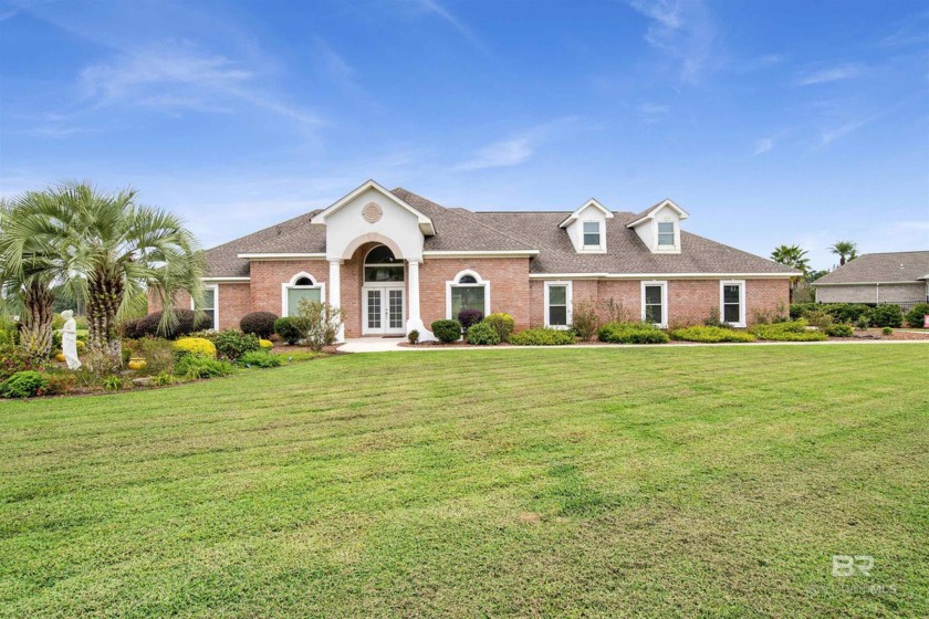 Impeccable! From the curb appeal with lush landscape, golf - Beach Home for sale in Foley, Alabama on Beachhouse.com