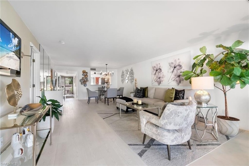 Situated in the serene Pinewoods community of North Naples, this - Beach Condo for sale in Naples, Florida on Beachhouse.com