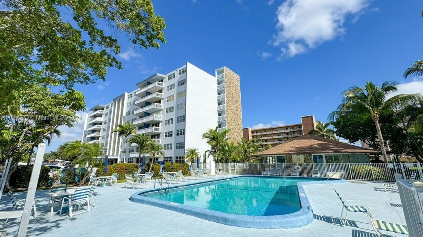 DISCOVER THE POTENTIAL OF THIS CHARMING FOUR FLOOR CONDO - Beach Condo for sale in Hallandale Beach, Florida on Beachhouse.com