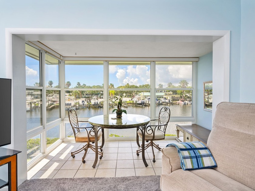 Must see furnished top floor condo overlooking canal, boats and - Beach Home for sale in Vero Beach, Florida on Beachhouse.com