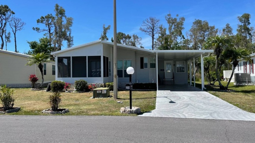 Priced to sell! So much house, a great value! When you pull into - Beach Home for sale in North Fort Myers, Florida on Beachhouse.com