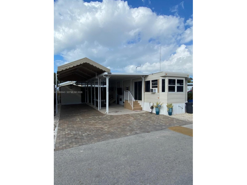 Welcome to your private retreat in Calusa Campground -- ideally - Beach Home for sale in Key Largo, Florida on Beachhouse.com