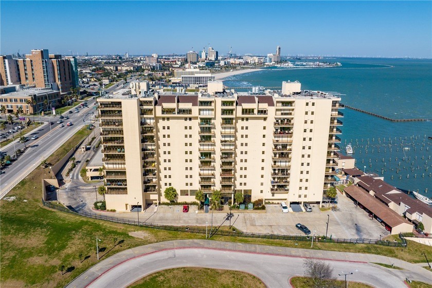 Perched above the city, this two-story penthouse delivers modern - Beach Condo for sale in Corpus Christi, Texas on Beachhouse.com