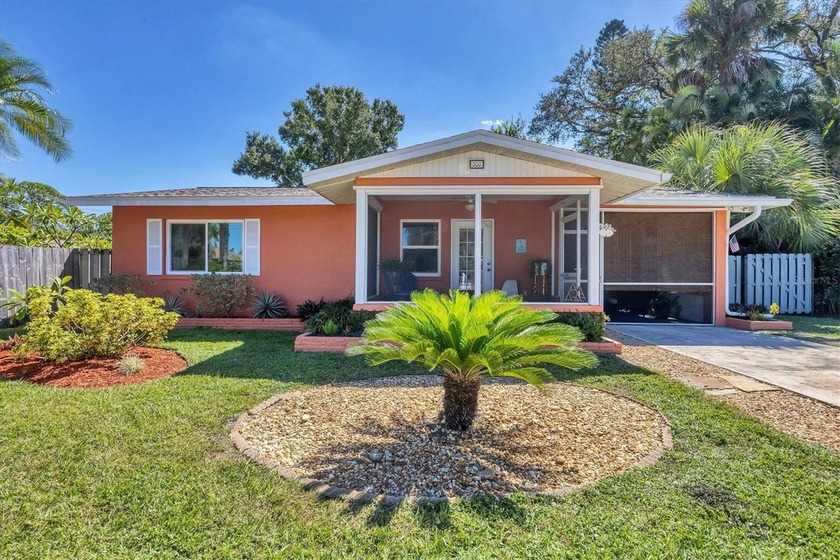 Huge curb appeal, complete with white picket fence, welcomes you - Beach Home for sale in Nokomis, Florida on Beachhouse.com