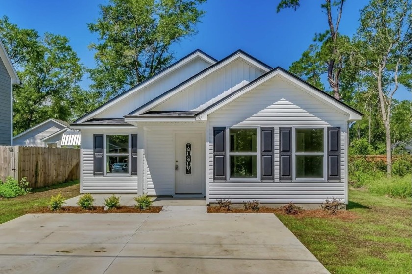 Welcome home to this AFFORDABLE, NEW CONSTRUCTION in Lake Ellen - Beach Home for sale in Crawfordville, Florida on Beachhouse.com