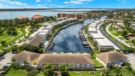 A million-dollar down canal view neighboring Jaycee Park. This - Beach Home for sale in Cape Coral, Florida on Beachhouse.com