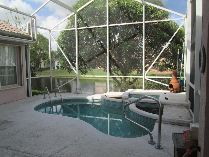WELCOME TO THIS MUST-SEE GATED COMMUNITY IN THE HEART OF - Beach Home for sale in Greenacres, Florida on Beachhouse.com