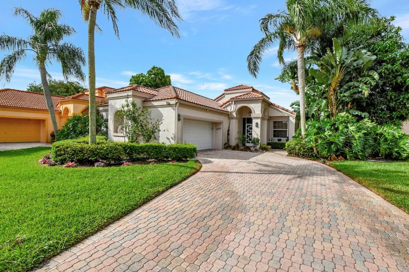 Absolutely stunning home on a serene lot with beautiful garden - Beach Home for sale in Boynton Beach, Florida on Beachhouse.com