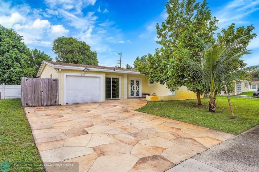 BEAUTIFUL HOME IN LAUDERDALE LAKES WITH NEW ROOF, NEW AIR - Beach Home for sale in Lauderdale Lakes, Florida on Beachhouse.com