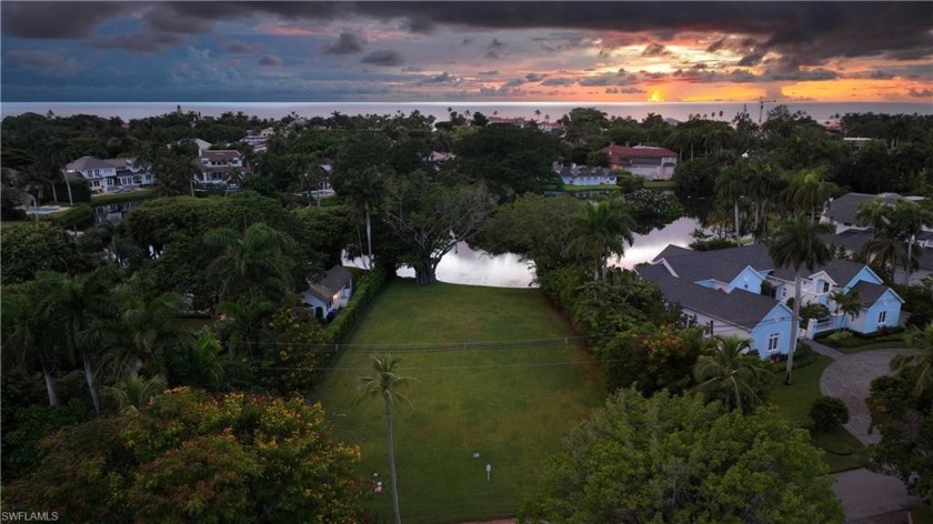 This stunning lot resides upon the quiet and serene Lantern Lake - Beach Lot for sale in Naples, Florida on Beachhouse.com