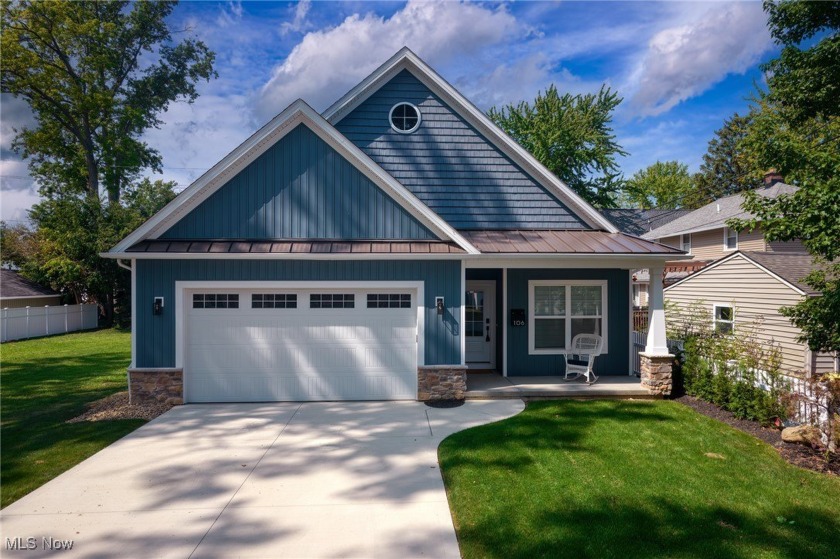 Nestled on a quiet street just steps from Lake Erie, this - Beach Home for sale in Avon Lake, Ohio on Beachhouse.com