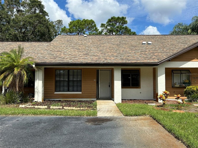 Step into this beautifully updated 2-bedroom, 2-bath villa in - Beach Home for sale in New Port Richey, Florida on Beachhouse.com