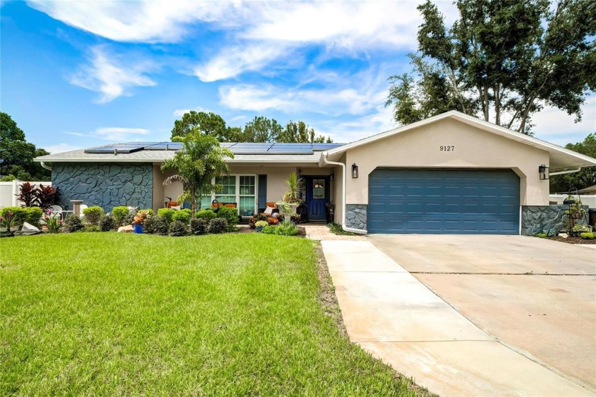 Welcome to your dream home, where beauty meets functionality in - Beach Home for sale in New Port Richey, Florida on Beachhouse.com