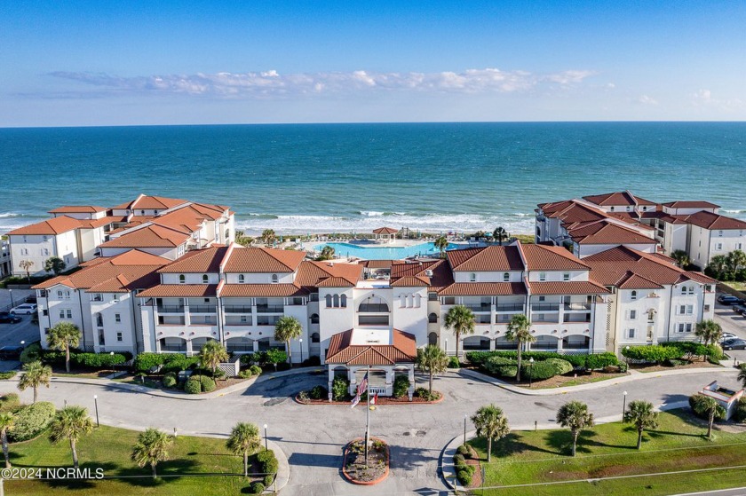 Experience the ultimate coastal living in this stunning ocean - Beach Condo for sale in North Topsail Beach, North Carolina on Beachhouse.com