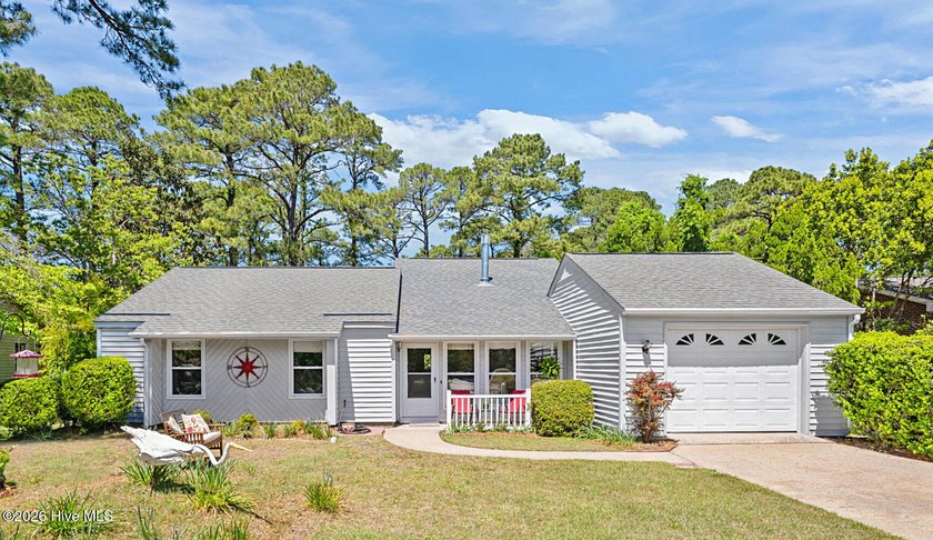 Set in a peaceful, park-like setting, this inviting home backs - Beach Home for sale in New Bern, North Carolina on Beachhouse.com