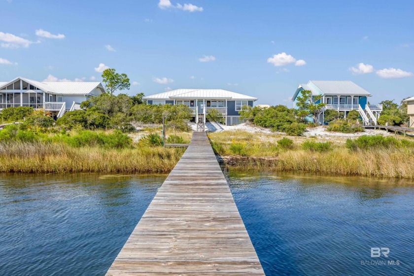 Raised beach cottage located on Old River across from the Gulf - Beach Home for sale in Orange Beach, Alabama on Beachhouse.com