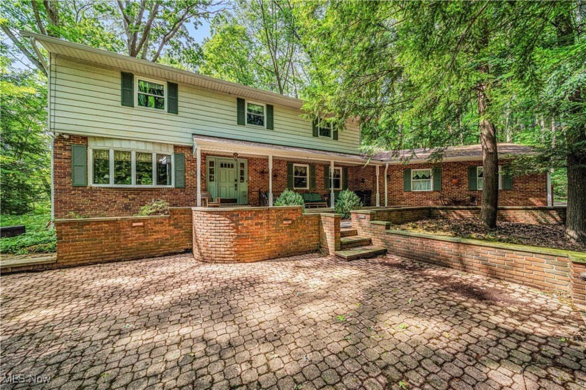 Tucked away in the heart of nearly 12.5 wooded acres, this - Beach Home for sale in Ashtabula, Ohio on Beachhouse.com