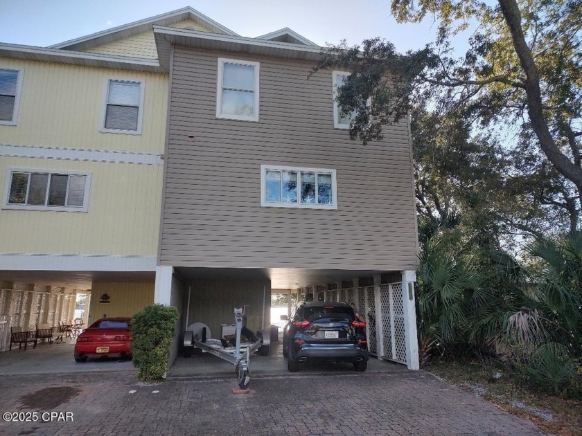 Great opportunity to own a waterfront home on North Lagoon in - Beach Home for sale in Panama City Beach, Florida on Beachhouse.com