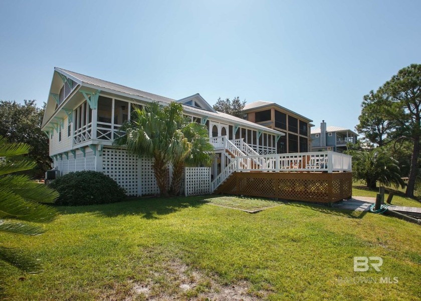 Serene Waterfront Haven Nestled on 81' of Canal Front Located in - Beach Home for sale in Orange Beach, Alabama on Beachhouse.com