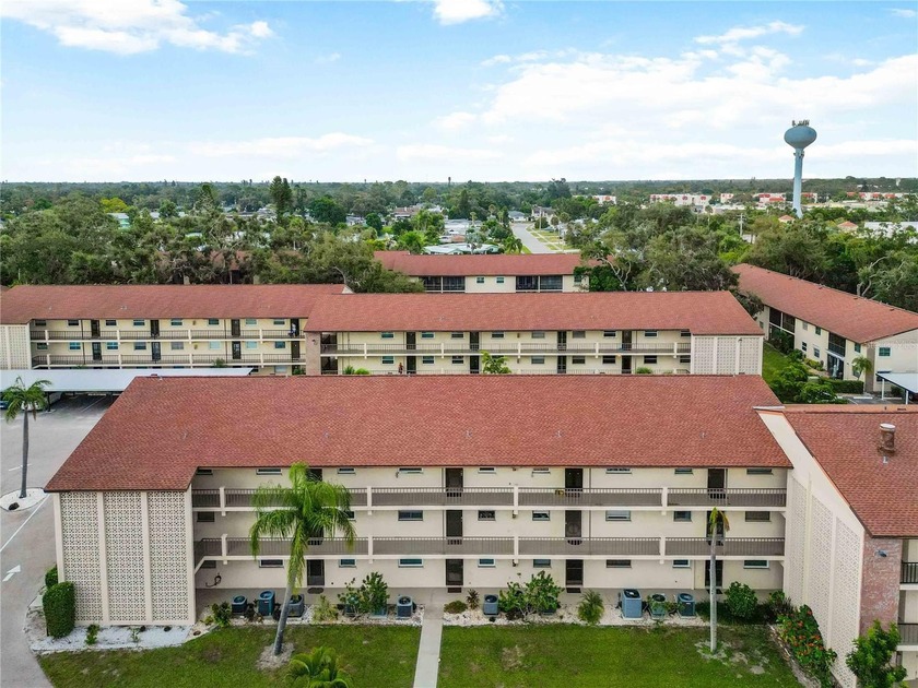 RARELY AVAILAIBLE 3-BEDROOMS . . . END UNIT . . . ACROSS FROM - Beach Condo for sale in Sarasota, Florida on Beachhouse.com