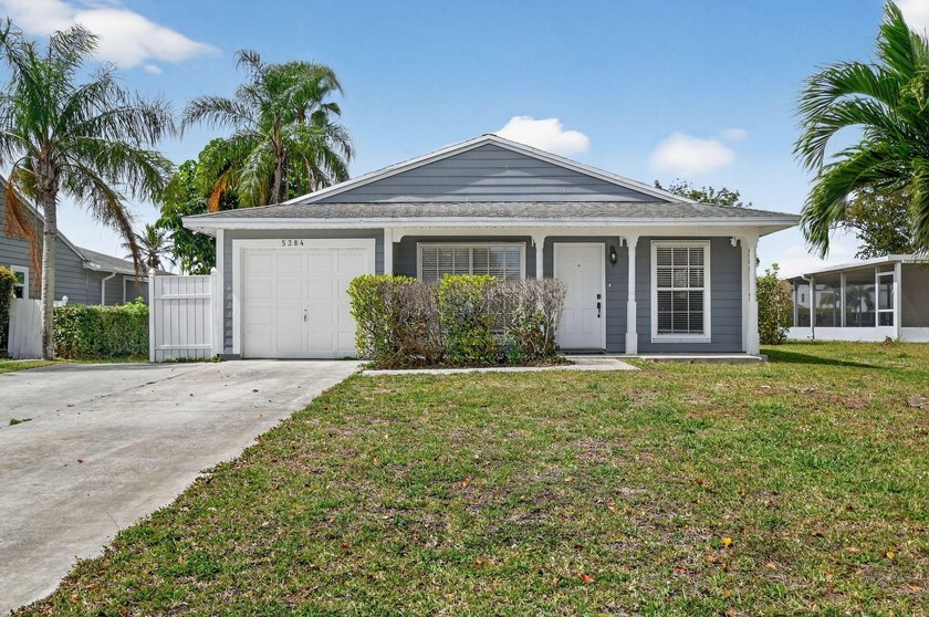 ASSUMABLE FHA LOAN @ 3.13%! Welcome to your waterfront sanctuary - Beach Home for sale in Boynton Beach, Florida on Beachhouse.com
