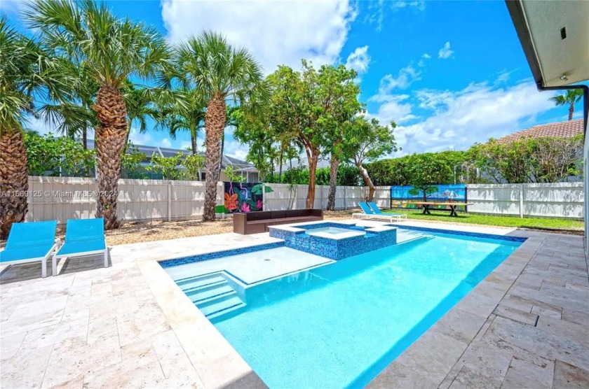 Best PRICED 5 bedroom 3 baths home with a pool in the exclusive - Beach Home for sale in Marco Island, Florida on Beachhouse.com