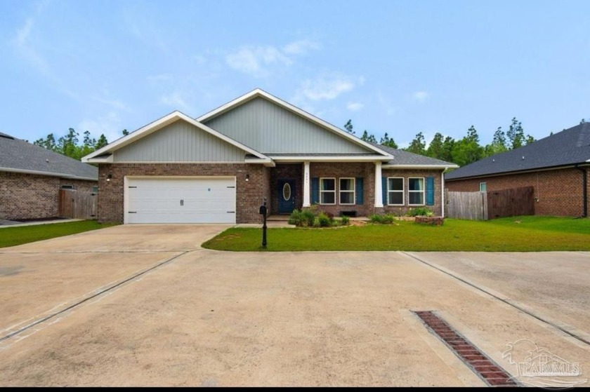 This gorgeous 4-bedroom, 2-bath split-level home located in the - Beach Home for sale in Milton, Florida on Beachhouse.com