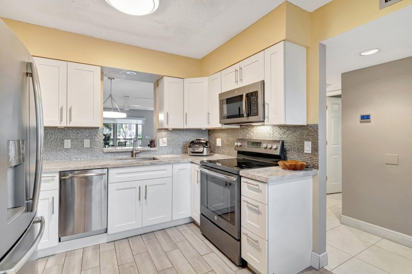 HUNTINGTON LAKES--SUPER ACTIVE ADULT COMMUNITY!Situated in the - Beach Condo for sale in Delray Beach, Florida on Beachhouse.com