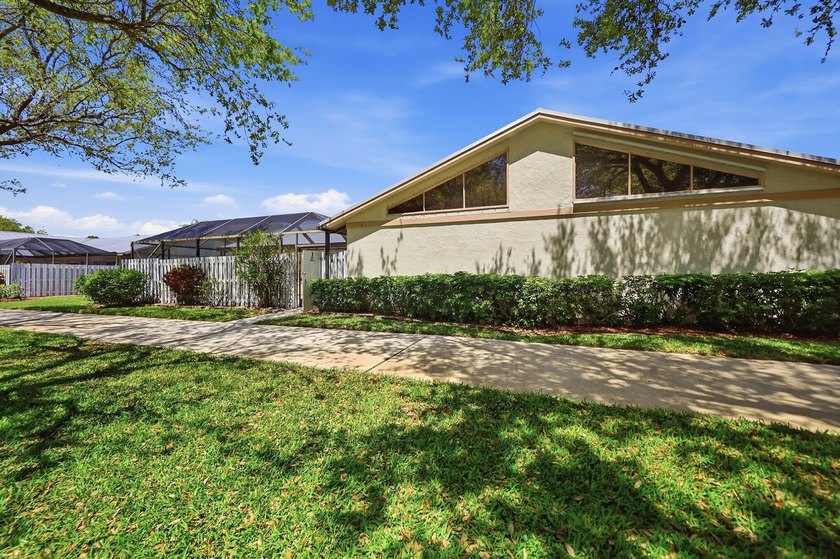 Welcome home to this beautiful patio villa pool home in the much - Beach Home for sale in Boynton Beach, Florida on Beachhouse.com