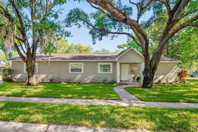 A beautiful Original Carrollwood home with 4 bedrooms, 3 - Beach Home for sale in Tampa, Florida on Beachhouse.com