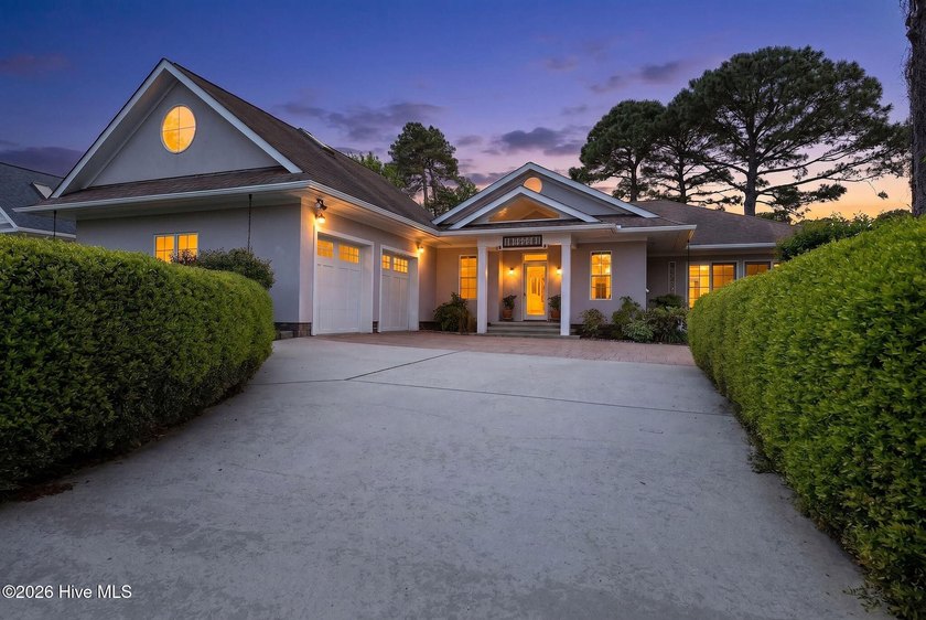 Positioned along the golf course in St. James Plantation, this - Beach Home for sale in Southport, North Carolina on Beachhouse.com