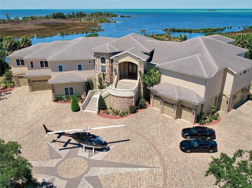 PRIVATE TROPICAL LUXURY ESTATE - This beautiful, Gulf front - Beach Home for sale in Spring Hill, Florida on Beachhouse.com