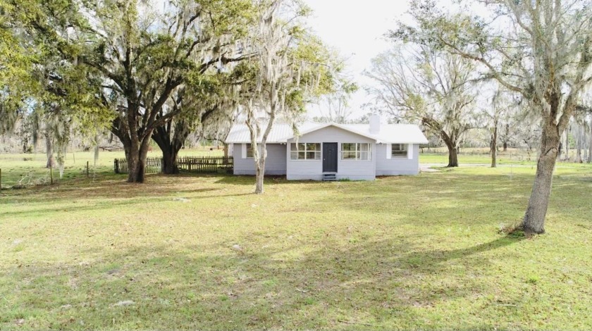 This lovely home, set on 15 acres, is a real gem with all the - Beach Home for sale in Perry, Florida on Beachhouse.com