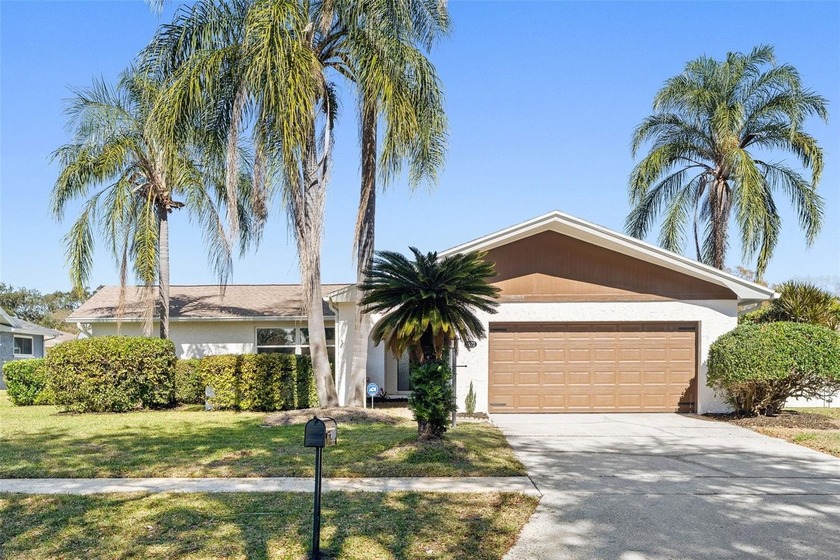 Welcome home to this beautifully updated 3-bedroom, 2-bath pool - Beach Home for sale in Clearwater, Florida on Beachhouse.com