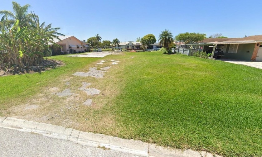 Nestled within Gulf Harbors you will find this oversized 1/4 - Beach Lot for sale in New Port Richey, Florida on Beachhouse.com