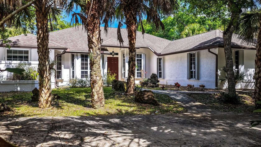 Nestled in a peaceful, highly desirable Palm Beach Country - Beach Home for sale in Palm Beach Gardens, Florida on Beachhouse.com