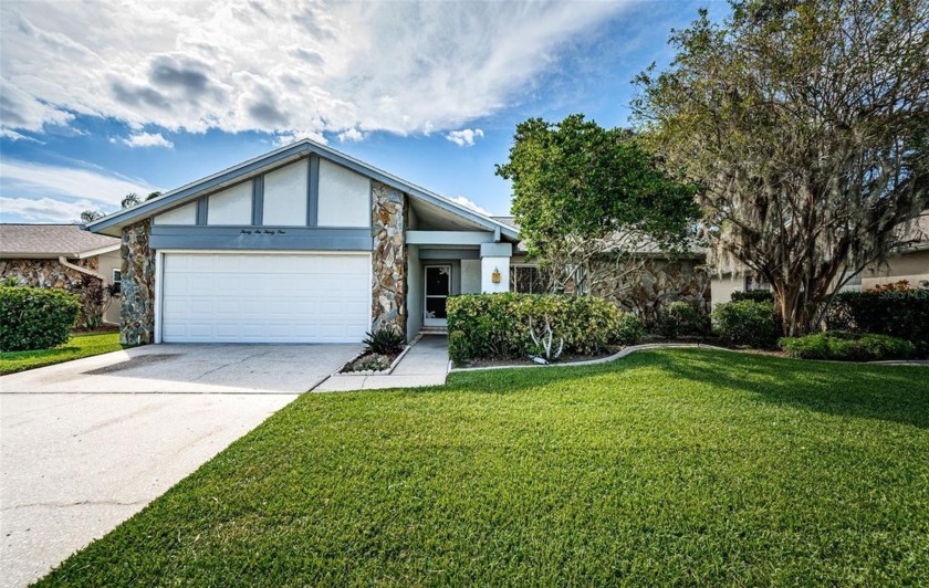 Welcome to this beautifully updated 2-bedroom, 2-bathroom home - Beach Home for sale in New Port Richey, Florida on Beachhouse.com