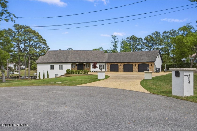 Tucked away on a quiet cul-de-sac in Hampstead, this stunning - Beach Home for sale in Hampstead, North Carolina on Beachhouse.com