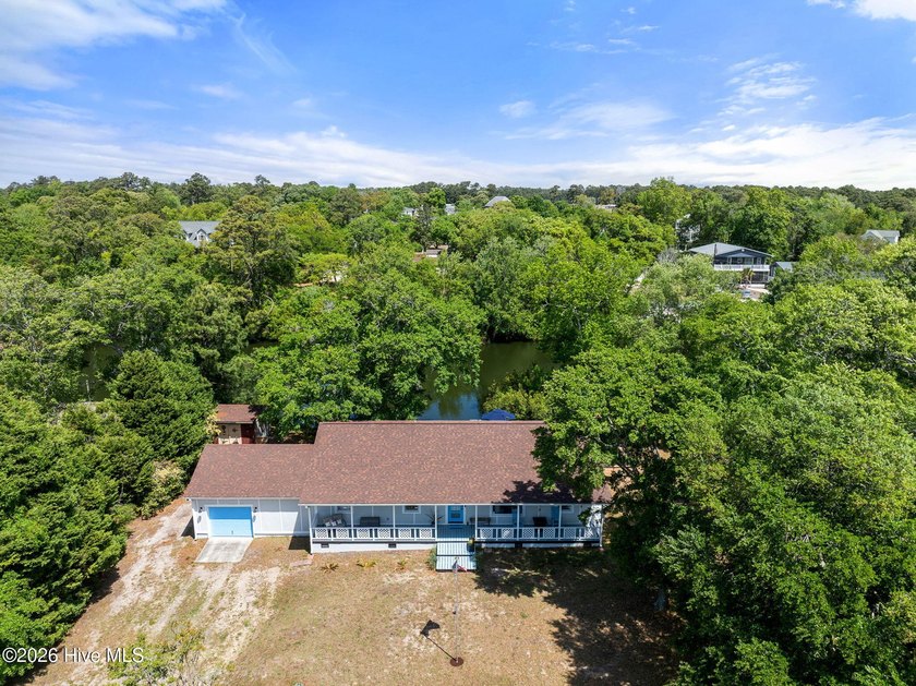 Welcome to coastal charm on Cockle Street, where lifestyle meets - Beach Home for sale in Surf City, North Carolina on Beachhouse.com