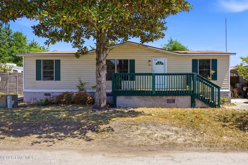 Discover this doublewide manufactured home located at 6140 - Beach Home for sale in Wilmington, North Carolina on Beachhouse.com