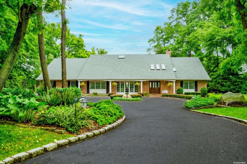 Nestled in Fort Salonga, on 1.4 acres with breathtaking views of - Beach Home for sale in Northport, New York on Beachhouse.com