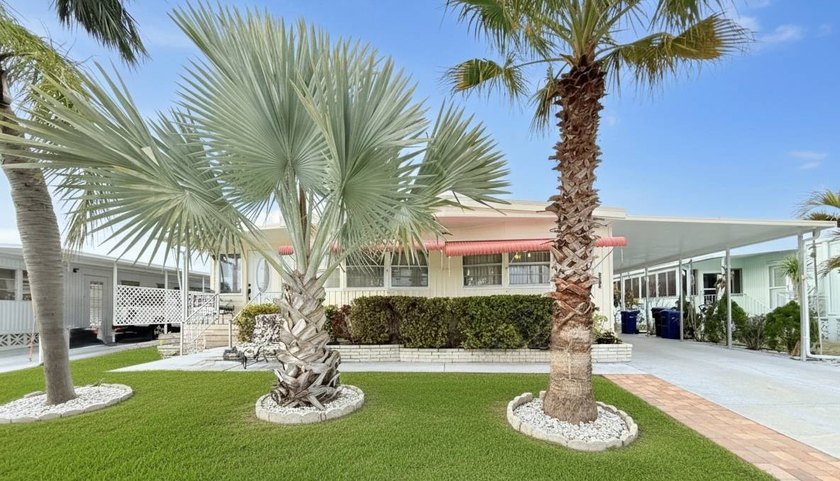 Welcome to this charming 2-bedroom, 2-bath manufactured home - Beach Home for sale in Sarasota, Florida on Beachhouse.com