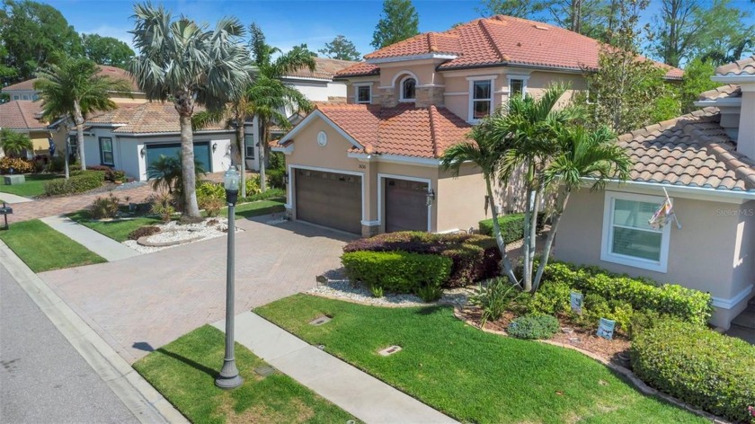 Nestled in the exceptional gated community of Grand Cypress - Beach Home for sale in Palm Harbor, Florida on Beachhouse.com
