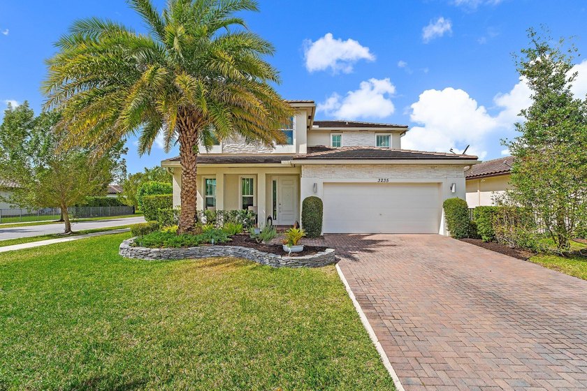 Welcome to this beautifully maintained 4-bedroom, 3-bath home - Beach Home for sale in Royal Palm Beach, Florida on Beachhouse.com