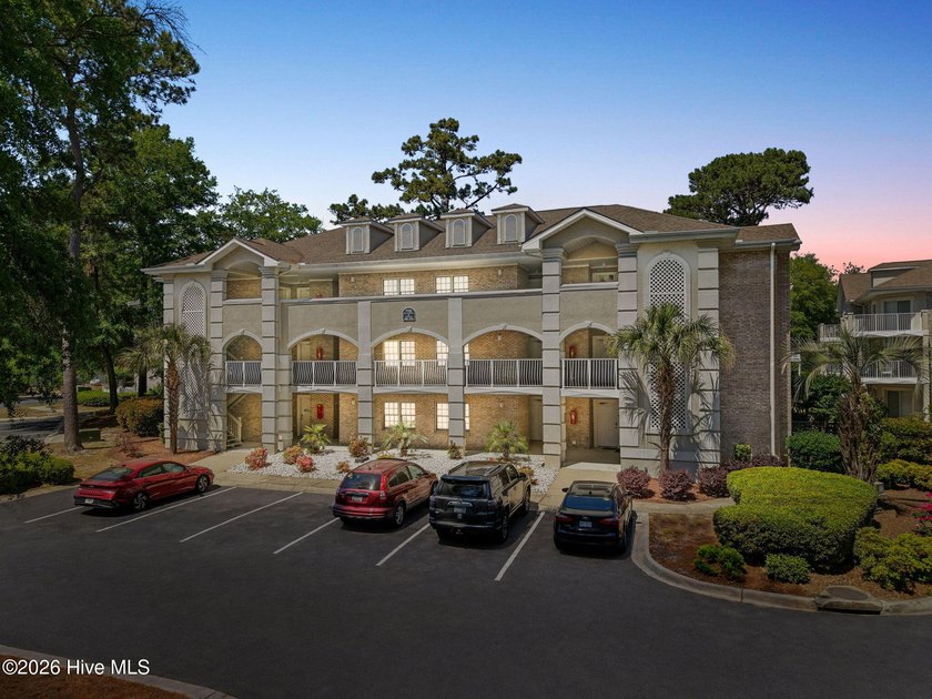 Welcome home to this beautifully maintained top-floor condo in - Beach Condo for sale in Sunset Beach, North Carolina on Beachhouse.com
