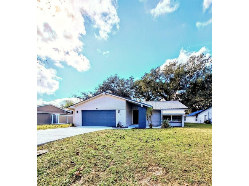 Discover your dream home in this beautifully remodeled 3-bedroom - Beach Home for sale in Palm Coast, Florida on Beachhouse.com