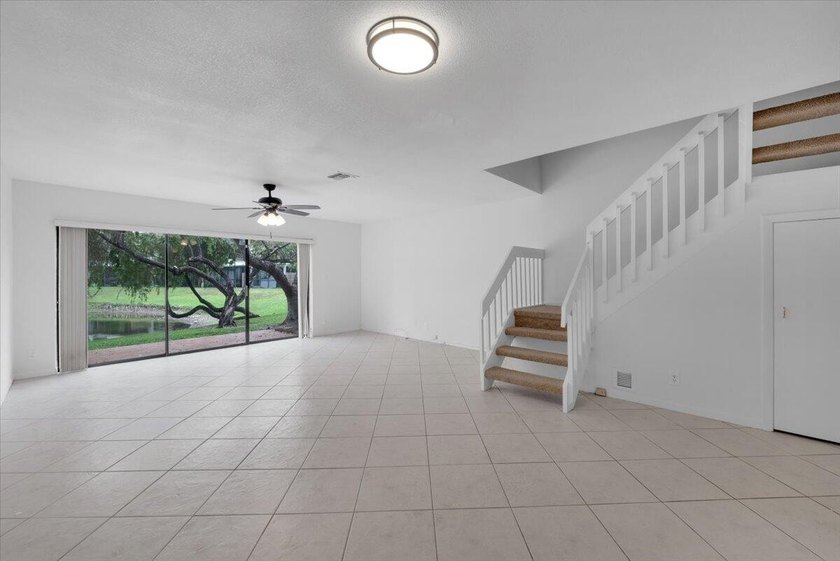 Nestled along a picturesque lake, this beautiful 2-bedroom, 2 & - Beach Townhome/Townhouse for sale in Lauderhill, Florida on Beachhouse.com