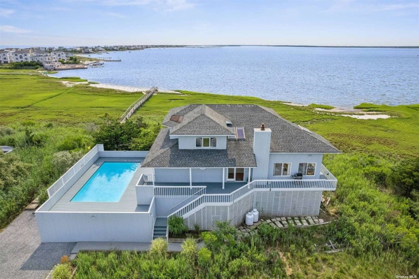 Sunrise to sunset, enjoy breathtaking views from this charming - Beach Home for sale in Westhampton, New York on Beachhouse.com